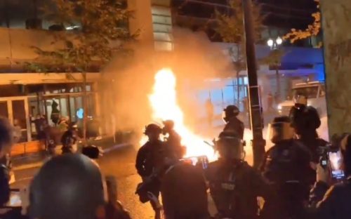 WATCH: Portland rioter tosses Molotov cocktail at police