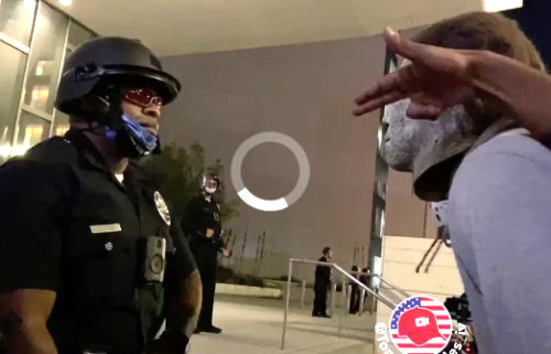 WATCH: LAPD officer is a Sphinx of patience amid anarchist taunts